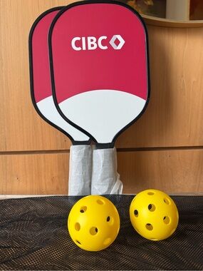 BNIB CIBC Branded Pickleball Paddles with Yellow Balls in Mesh Bag